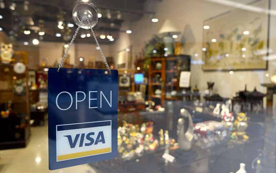 Visa sponsored 'open' sign at shopfront