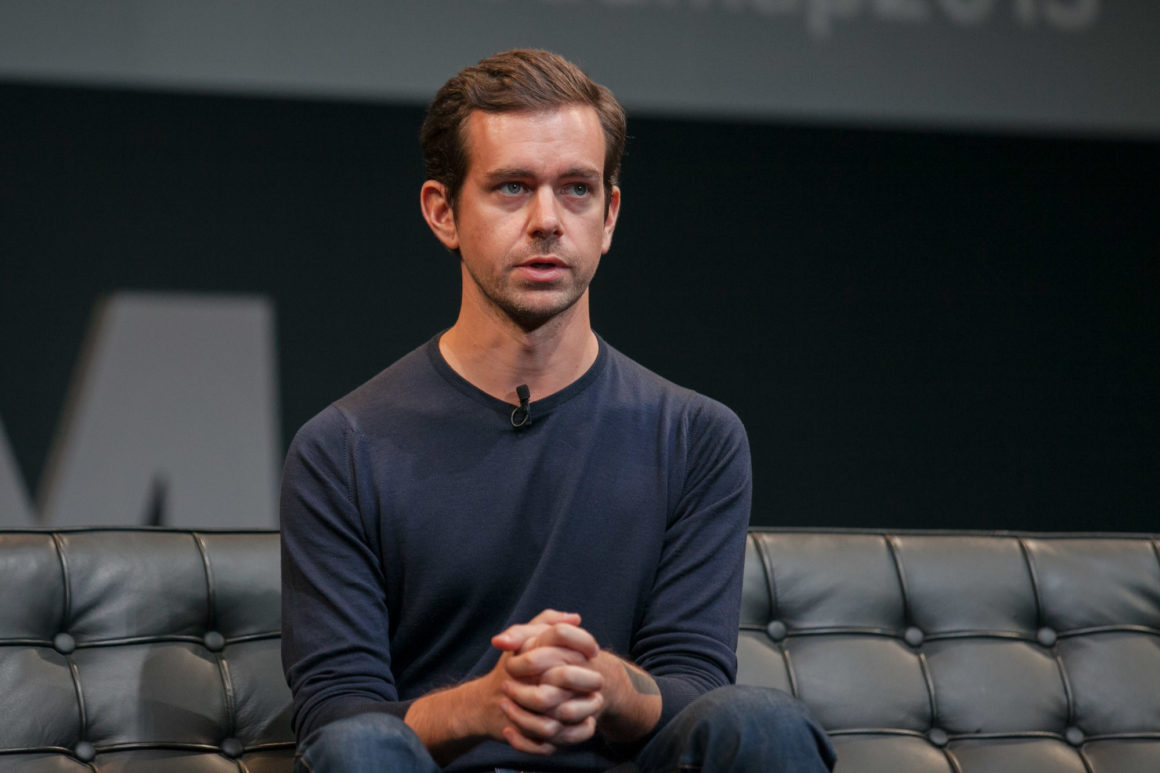 Twitter CEO Jack Dorsey sitting on a couch during a live event