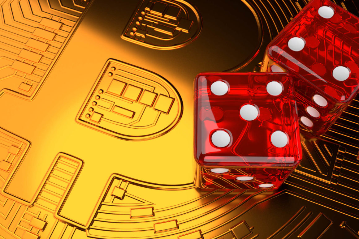 Two dice on top of Bitcoin