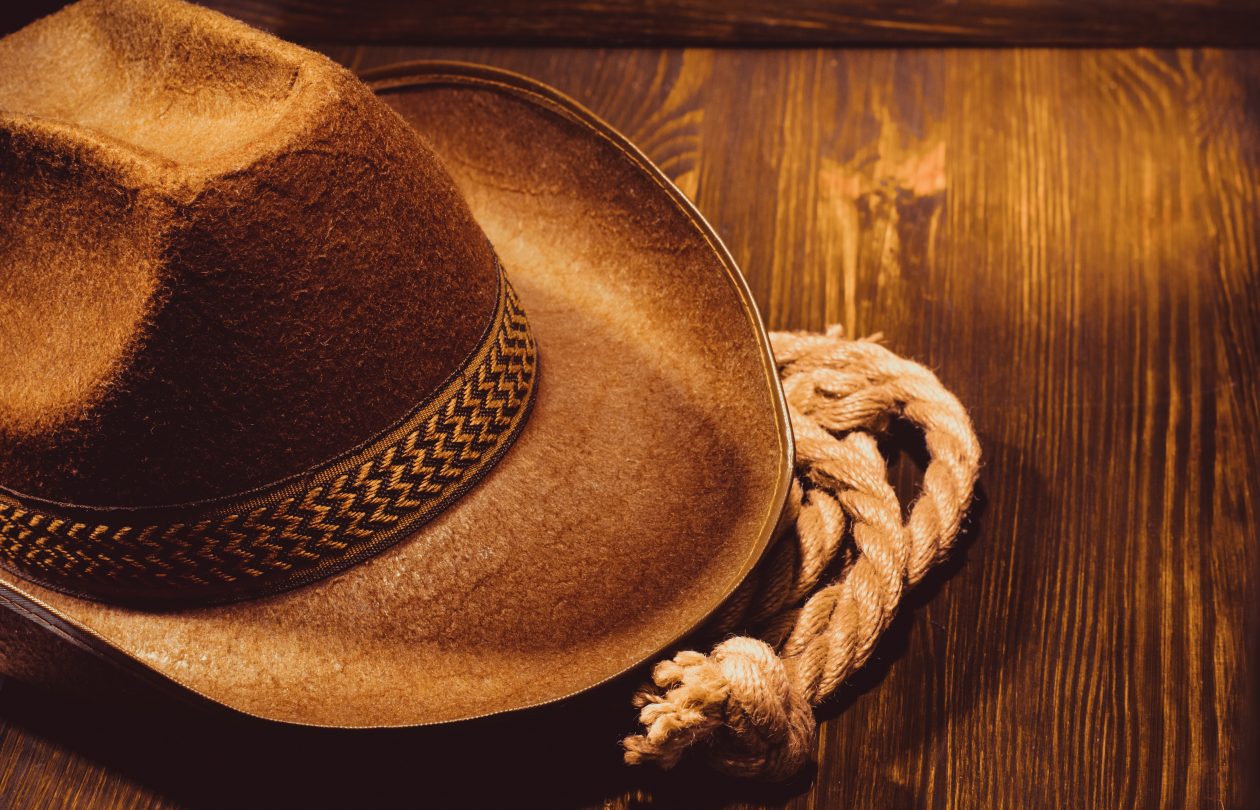 cowboy hat on wood PXCB9DA