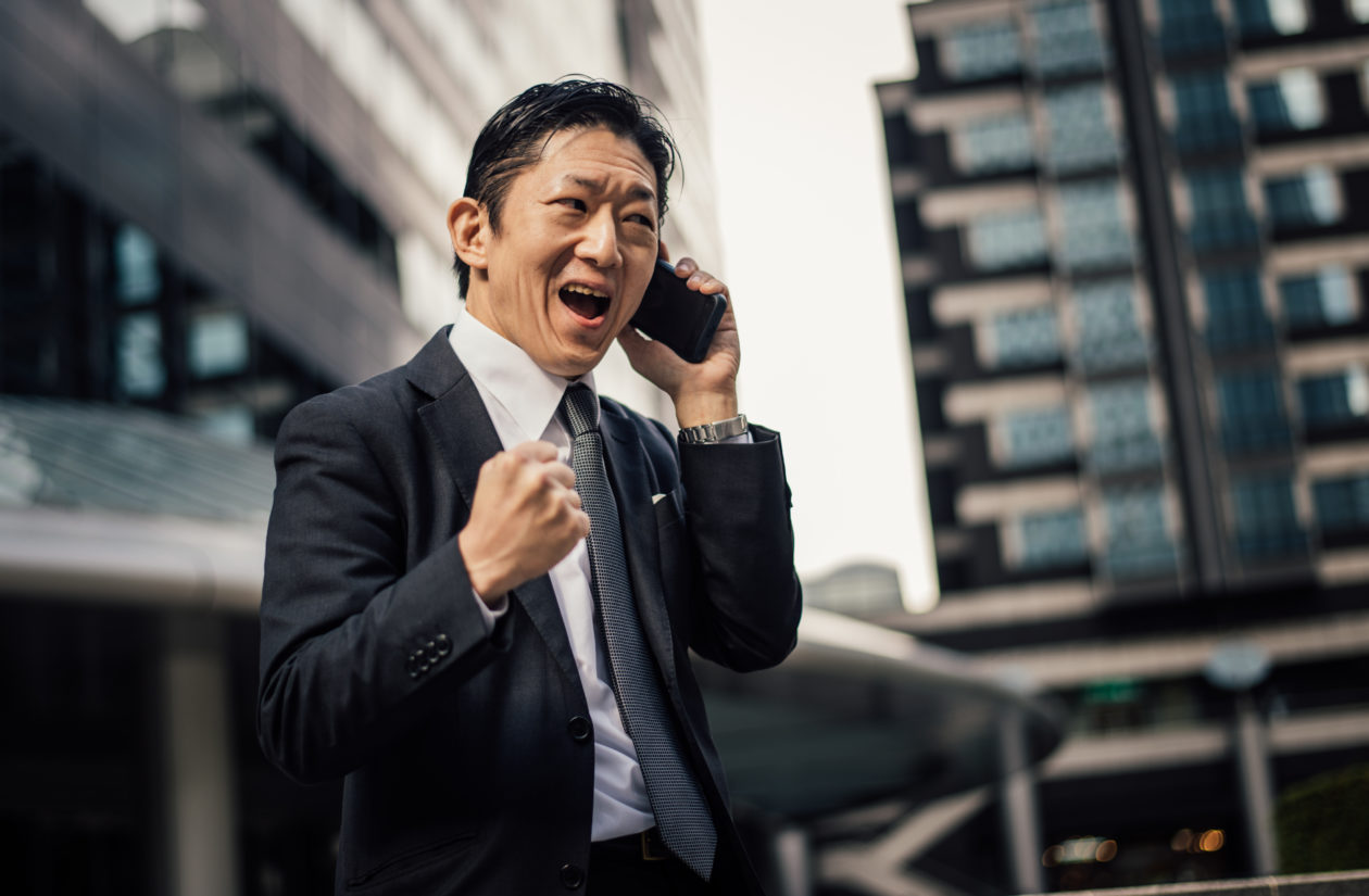 Senior business man moments on the streets of Tokyo