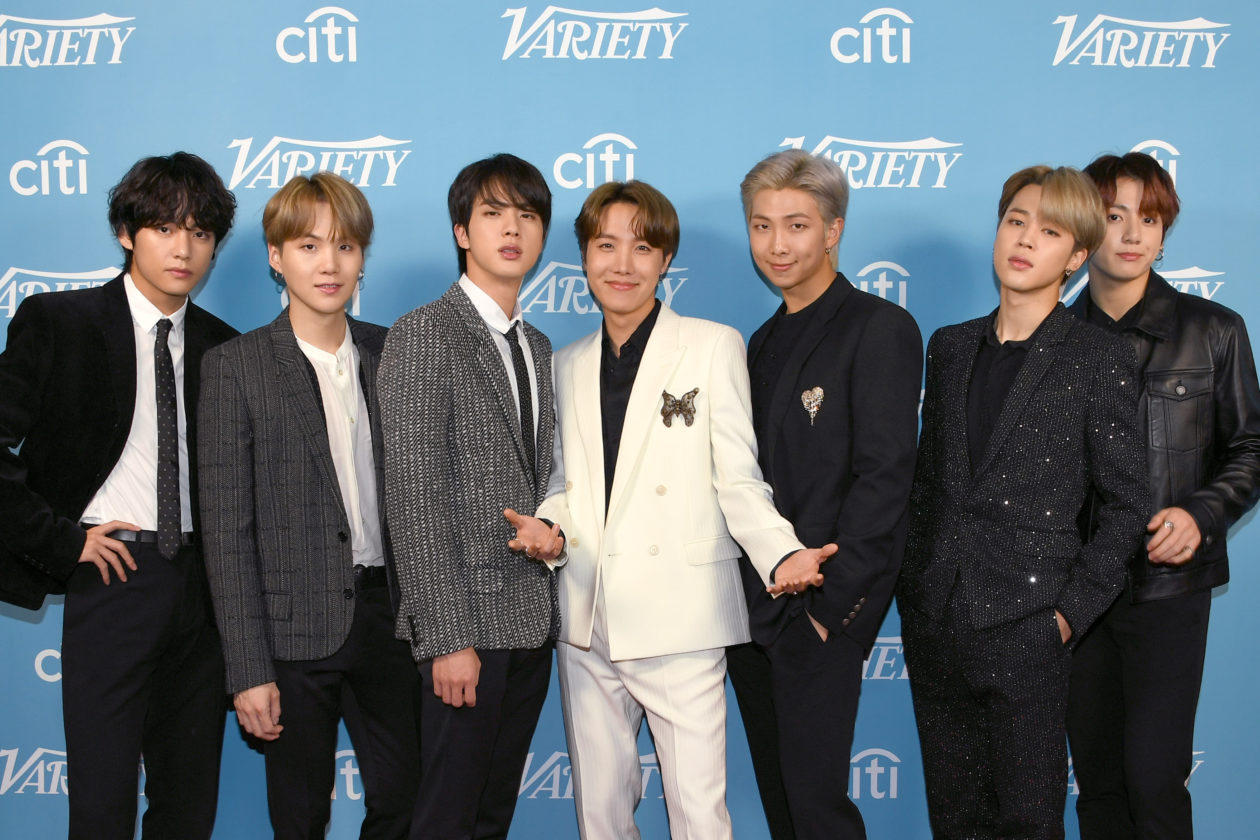 BTS members at the 2019 Variety's Hitmakers Brunch | Debate continues on validity of crypto tax law in Korea when "BTS NFTs" are left untaxed.