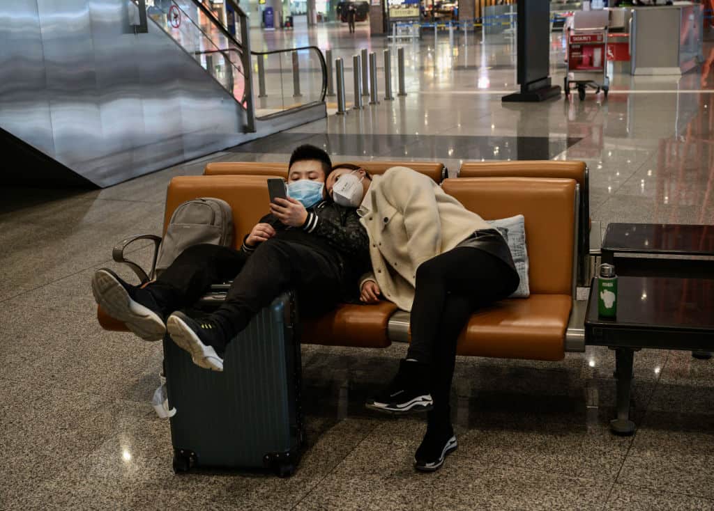 Travelers waiting in Chinese airport