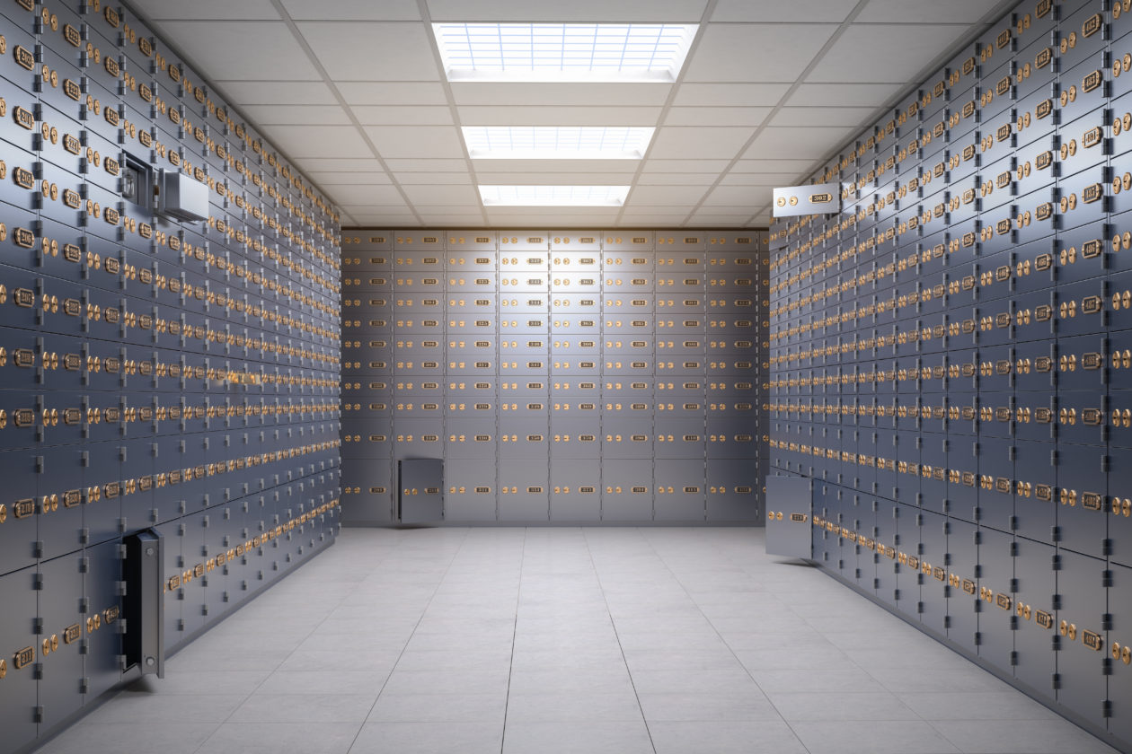 Crypto custody safe deposit boxes room inside of a bank vault.