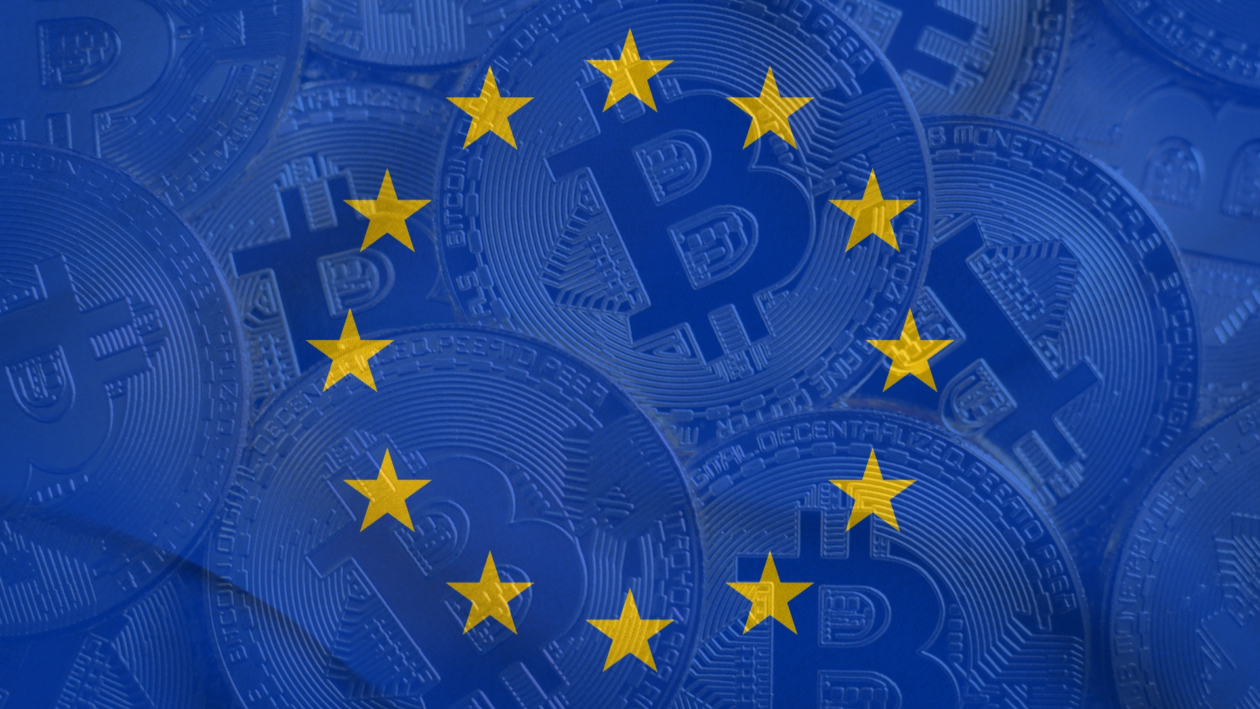 European Union flag layered in front of Bitcoins