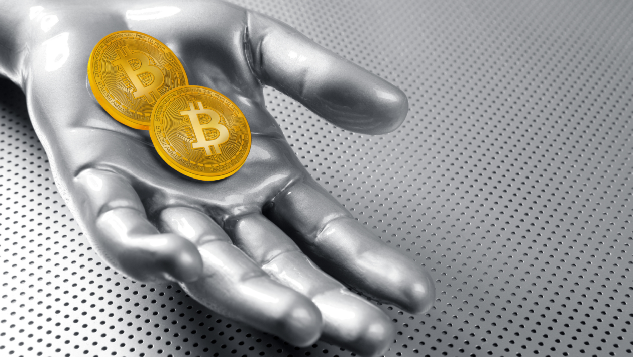 Bitcoin BTC cryptocurrency on silver futuristic hand