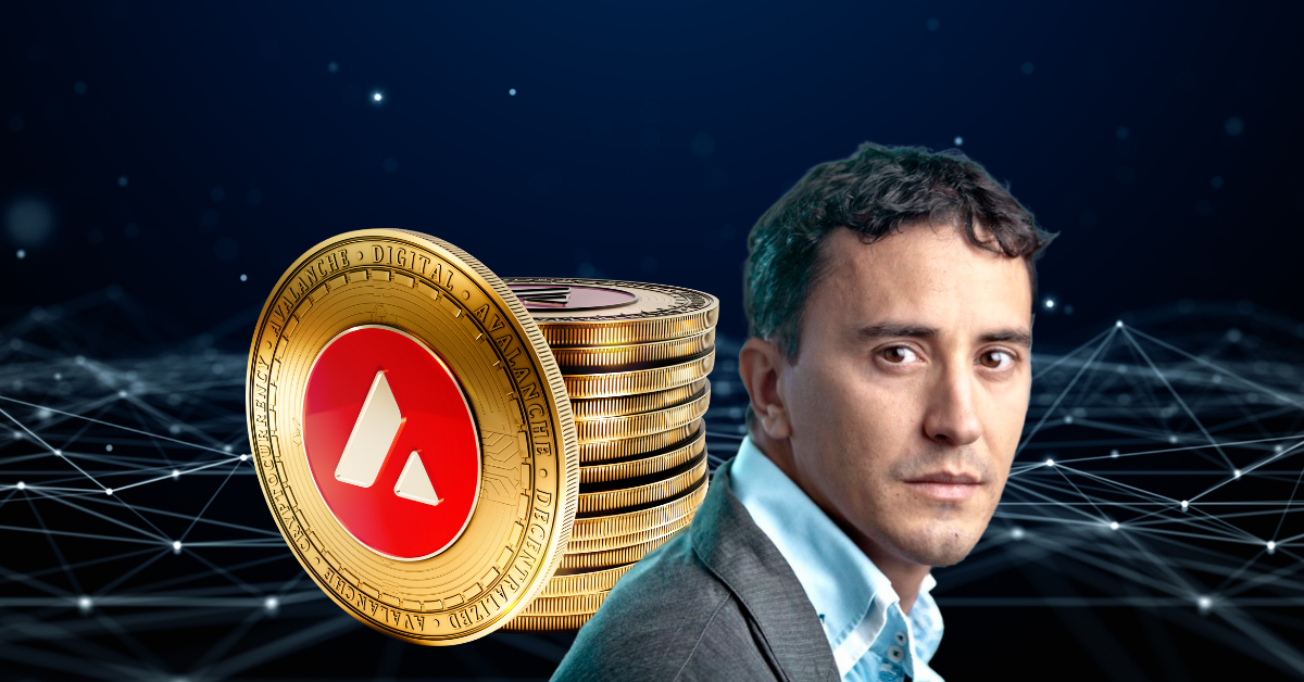Ava Labs founder Emin Gun Sirer pictured in front of a stack of AVAX cryptocurrency tokens