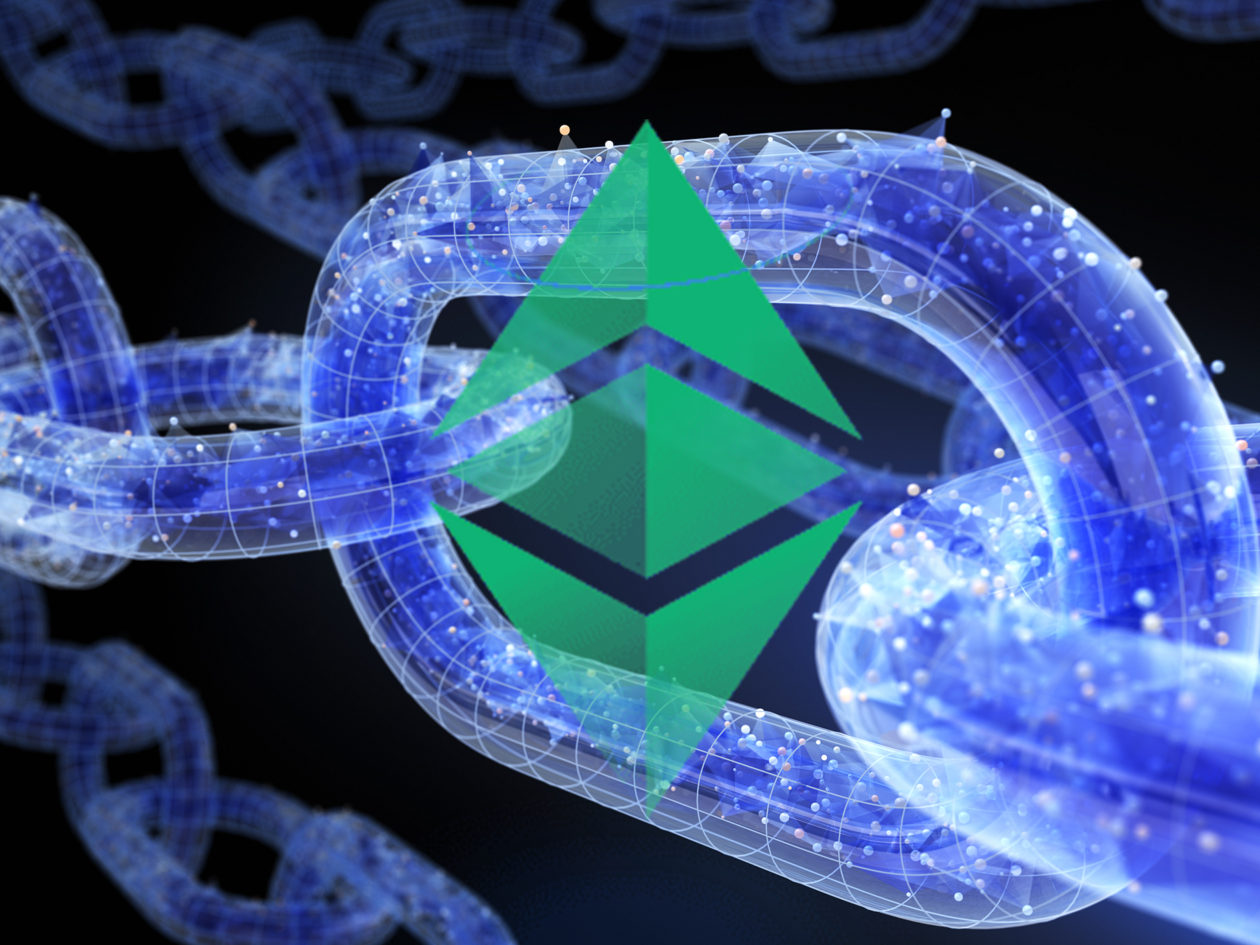 ethereum classic logo infront of giant digital chain | Ethereum Classic’s “Merge” surge not expected to last: report | ethereum classic, ethereum merge, ethereum merge news, ethereum classic price
