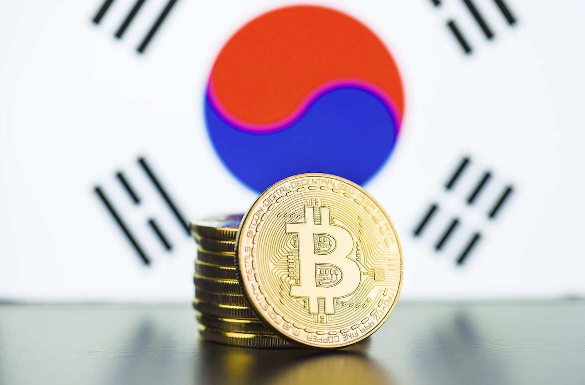 Golden bitcoins and South Korea flag