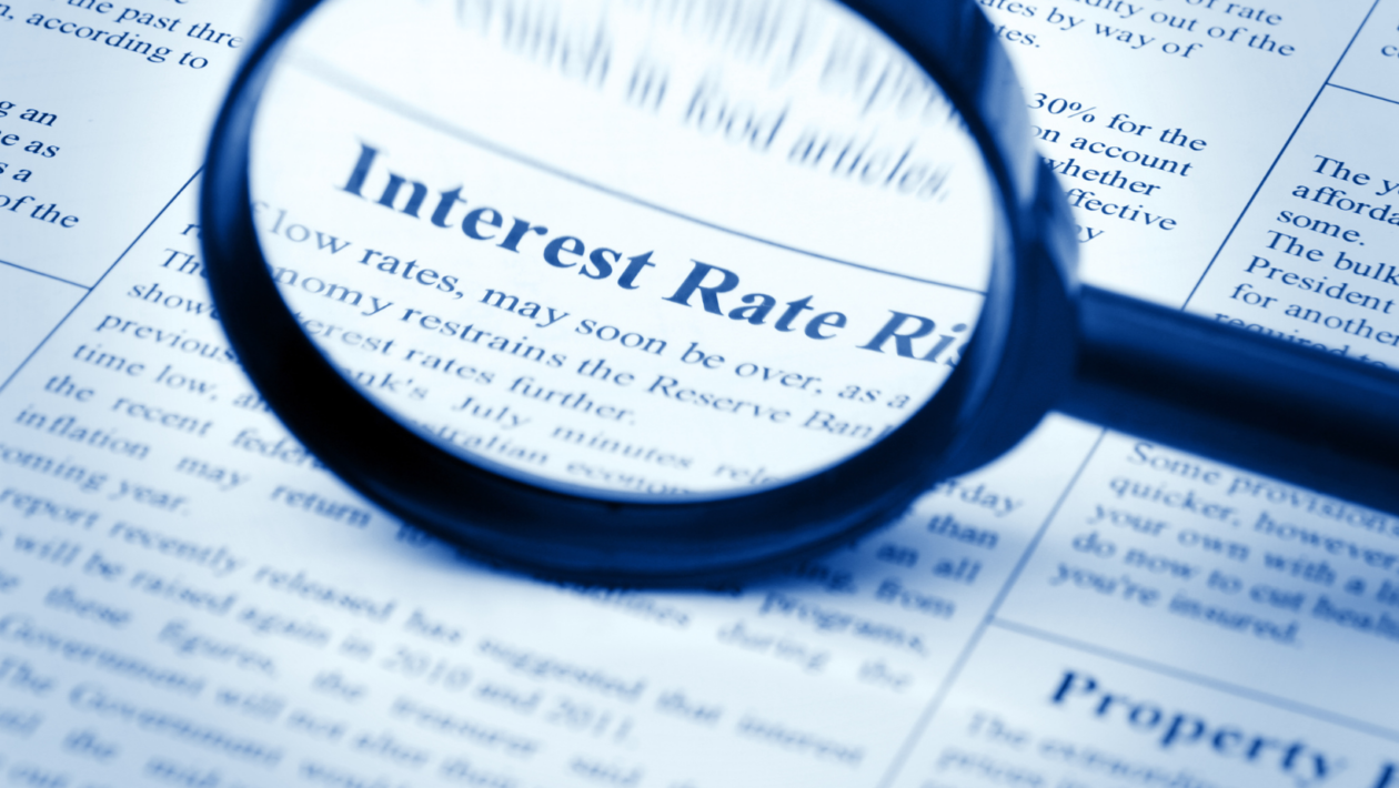 words "Interest Rate" in a newspaper is magnified