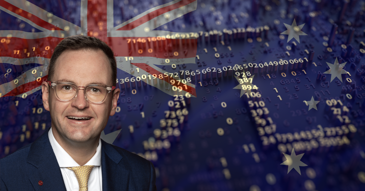 Australian Senator Andrew Bragg in front of translucent Australian flag on top of the Chinese yuan sign. 