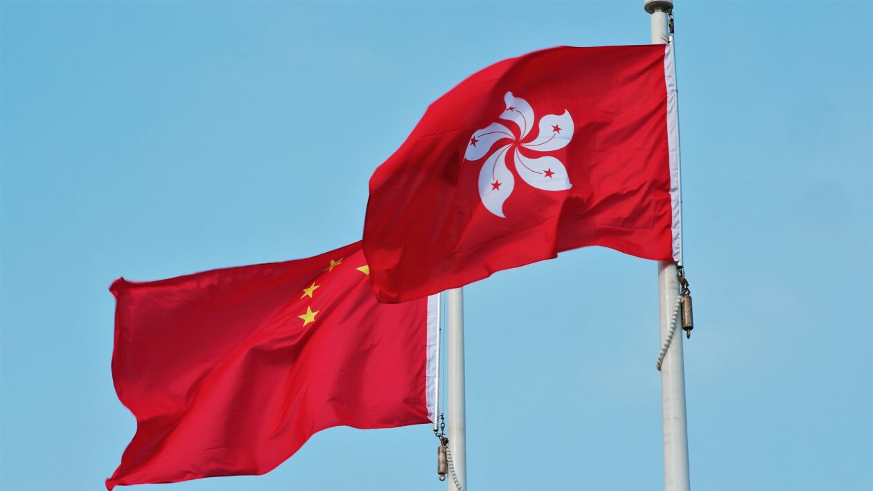 Flag of China and Hong Kong Waving with blue sky