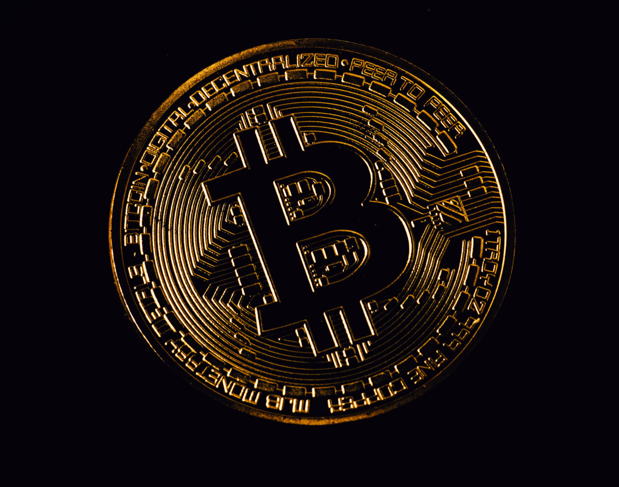 Bitcoin cryptocurrency token on a dark background. | Wallet linked to defunct crypto exchange BTC-e activates