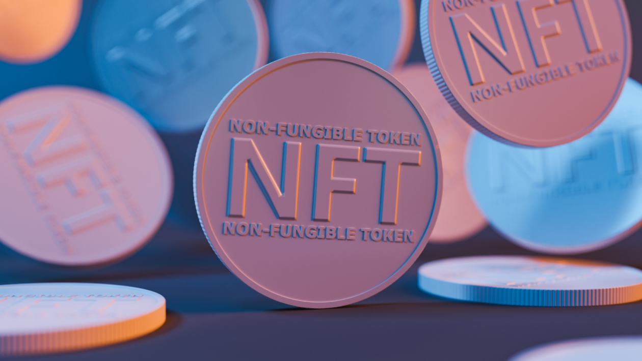 close up photo of NFT coins with neon lighting