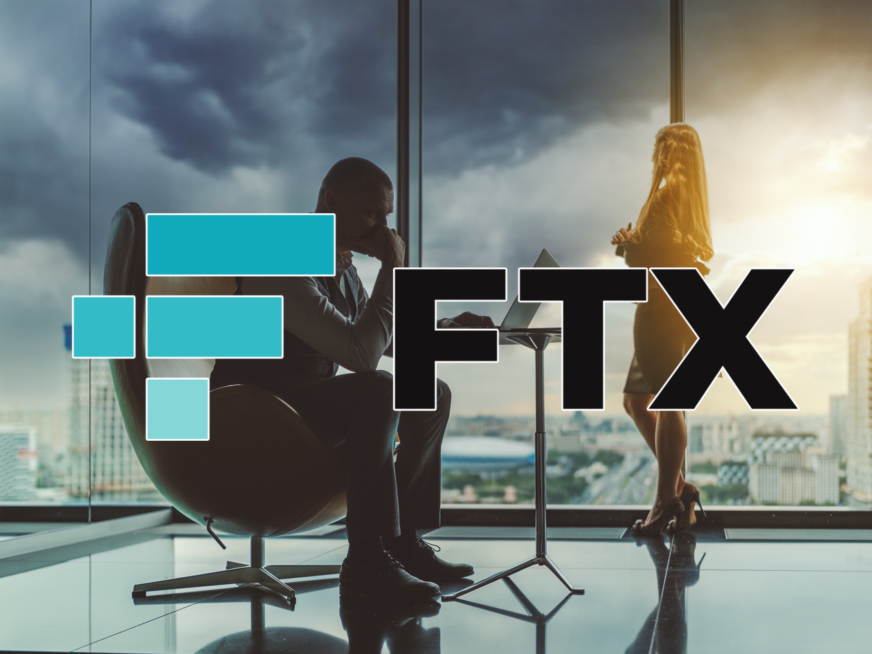 FTX Logo, with two people talking face to face in the background