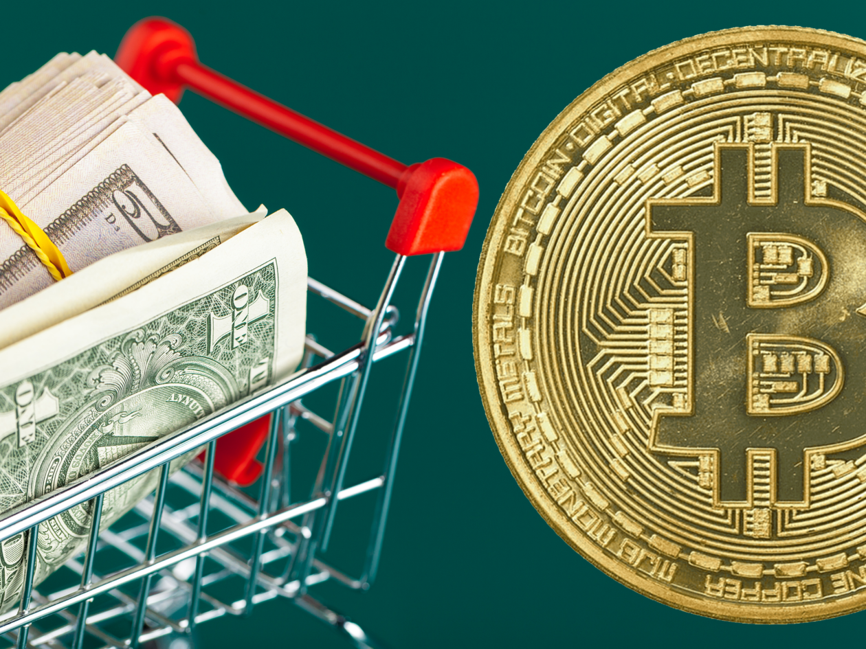 shopping cart with us dollar bills inside, golden bitcoin token | Markets: Bitcoin, Ether prices rise as November U.S. inflation reading lower than expected | bitcoin price today, ether price, crypto market today, us cpi, fed interest rate