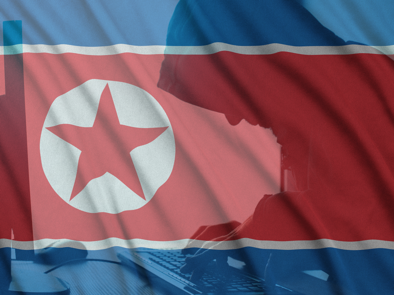 dprk flag and crypto hacker on computer | North Korea is another victim of FTX collapse, analyst says | lazarus, dprk, north korea crypto hack