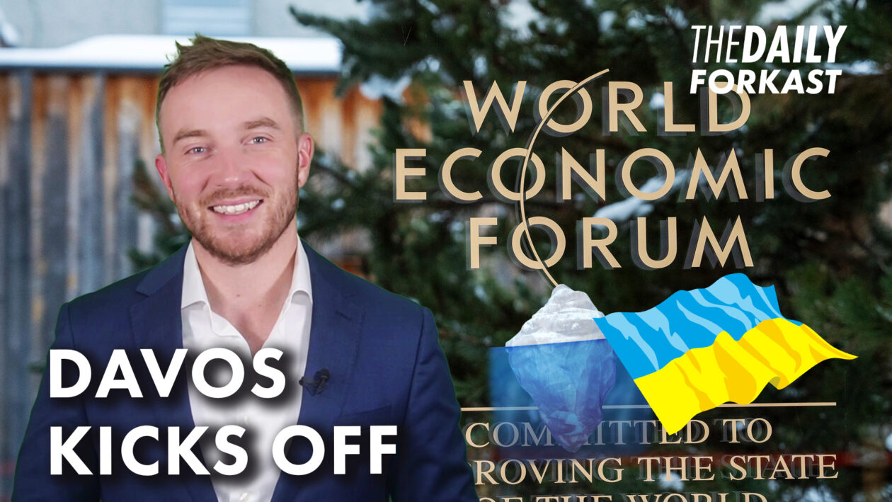 TDF host Joel Flynn layered in front of World Economic Forum sign, an ice berg and the Ukrainian flag. Davos kicks off