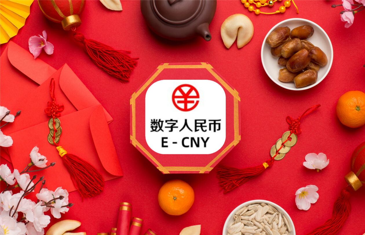 E-CNY logo on a Lunar New Year themed table | Digital yuan sales over Lunar New Year up from last year, online retailers say | digital yuan, China, e-CNY, CBDC