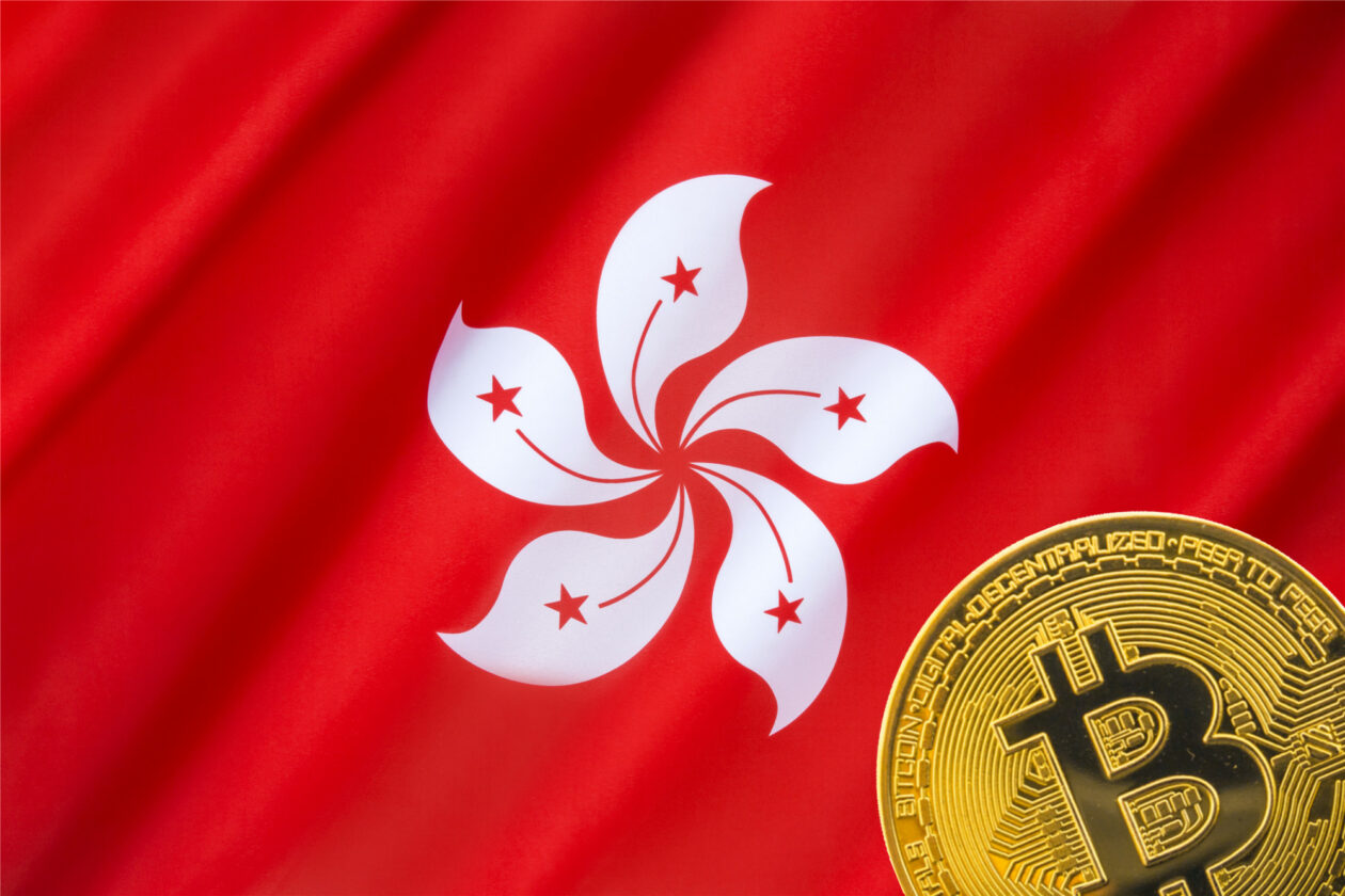 Hong Kong flag with Bitcoin at the corner | Hong Kong’s new crypto regulation may lure Web3 firms back, experts say | Hong Kong, Web 3.0, Regulation & Law, virtual asset service providers (VASP), SFC - Securities and Futures Commission