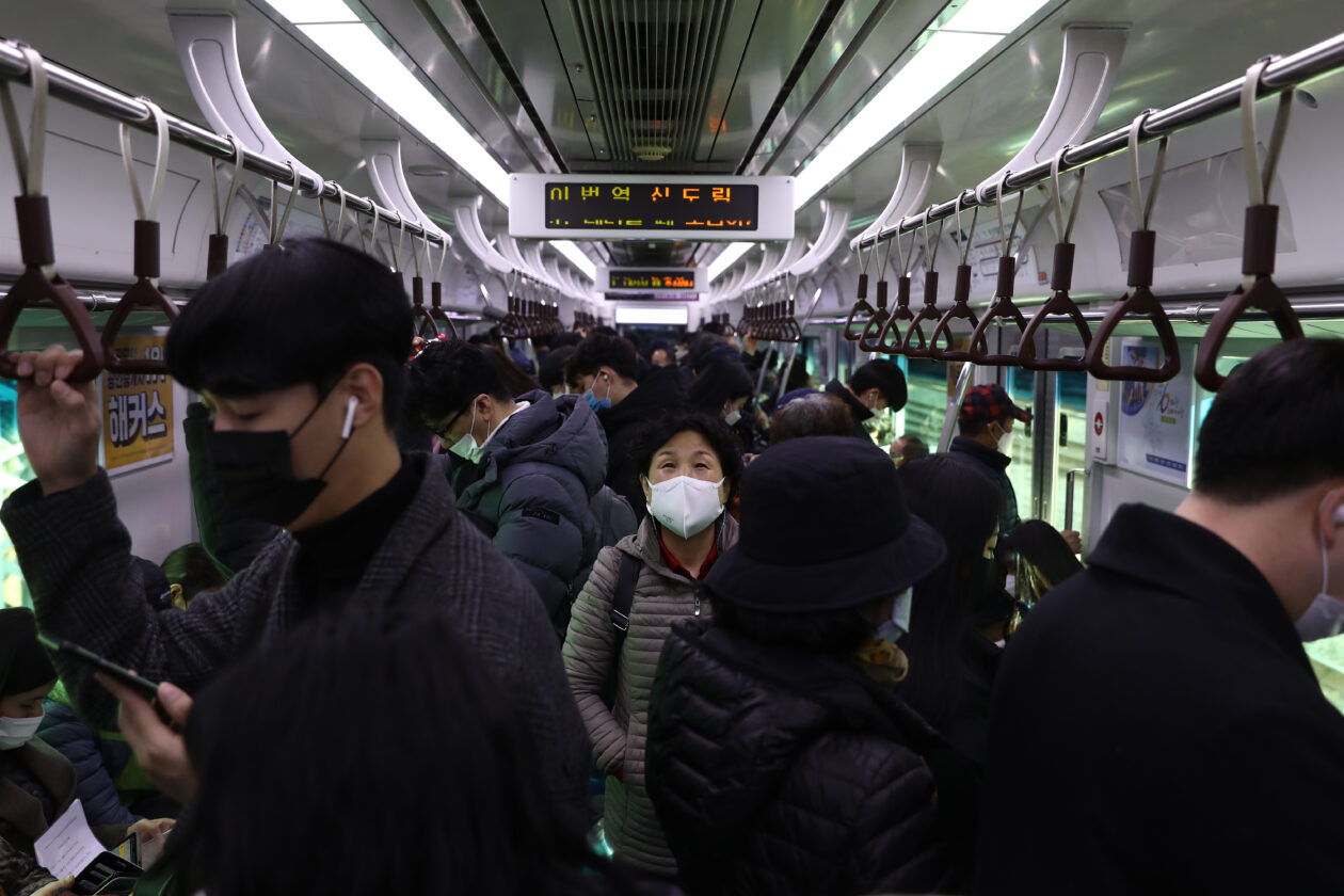 people inside South Korean subway train in Seoul | South Korea issues guideline on cryptocurrencies as securities tokens ahead of planned legalization | south korea sto security token securities token