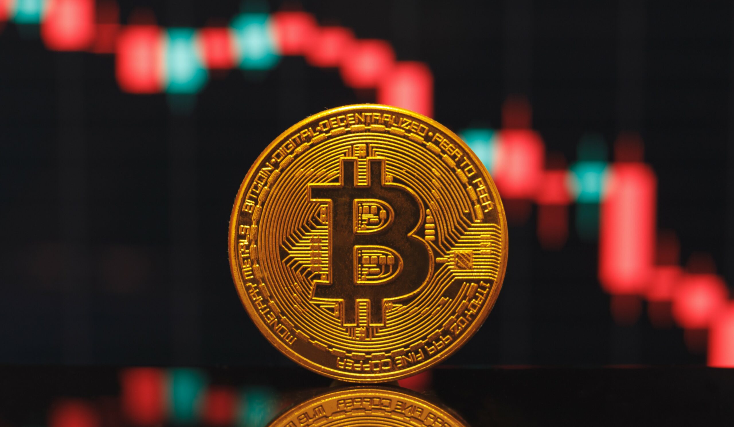 Bitcoin falls to near US$28,000, Ether trades flat