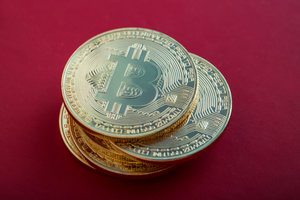 Bitcoin on red background | Bitcoin, Ether, other crypto fall as SEC waves big stick; Dogecoin gains; U.S. equity futures flat | Markets, BTC - Bitcoin, ETH - Ethereum, SEC - Securities and Exchange Commission, Gary Gensler