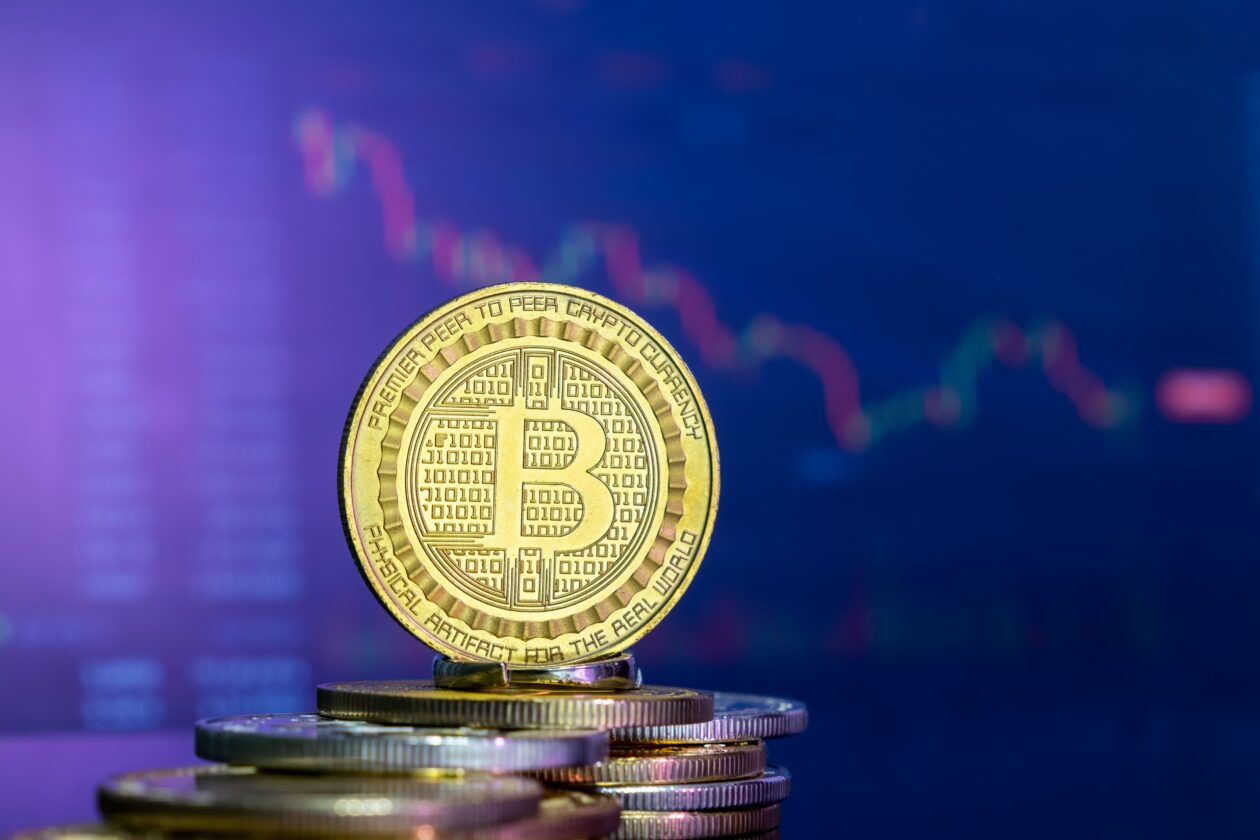 Bitcoin on purple-ish background | Bitcoin, Ether drop; US equities rise as inflation cools down | Markets, BTC - Bitcoin, ETH - Ethereum, Binance, Ripple