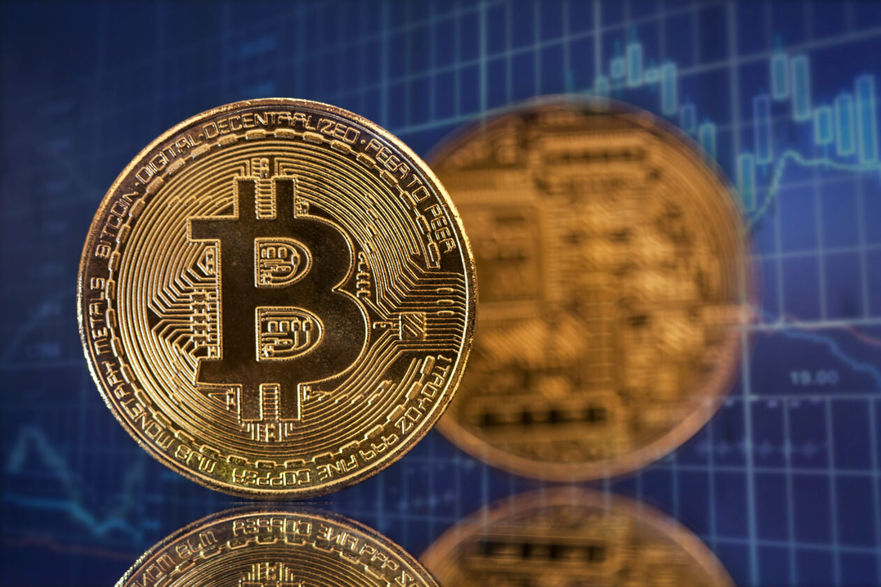 Bitcoin on blue background | Bitcoin up on bank jitters, price speculation; Ether dips, U.S. equity futures flat | Markets, BTC - Bitcoin, ETH - Ethereum, Binance, Bank