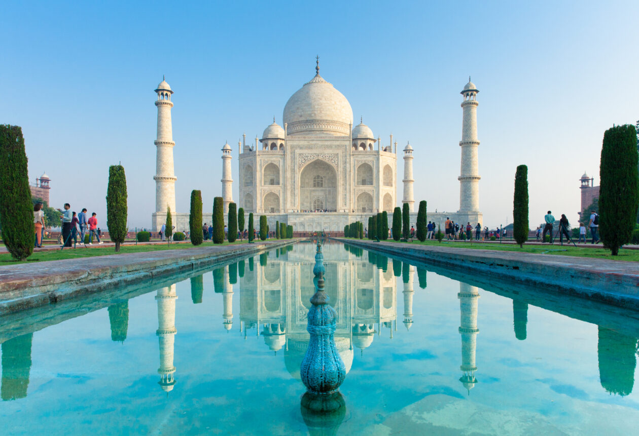 Wiew of Taj Mahal monument reflecting in water of the pool, Agra, India