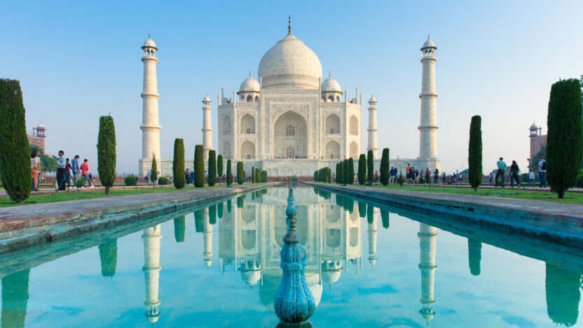 Wiew of Taj Mahal monument reflecting in water of the pool, Agra, India