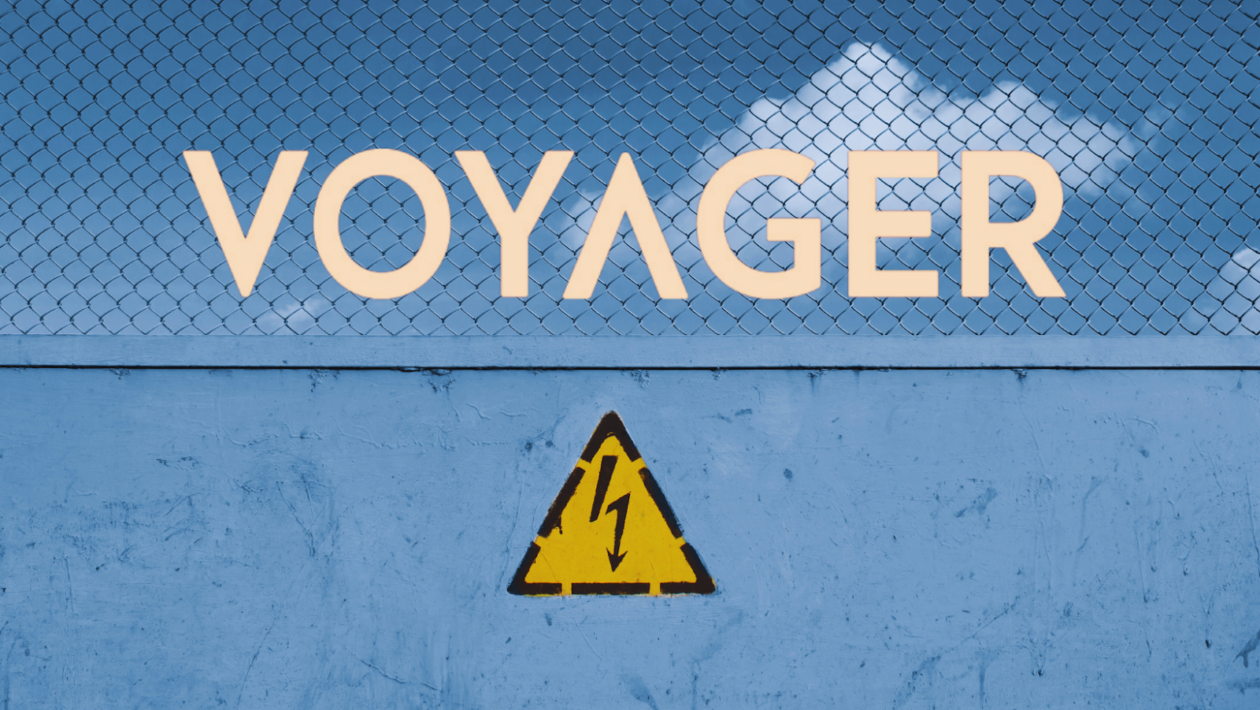 Voyager logo on top of high voltage sign. 