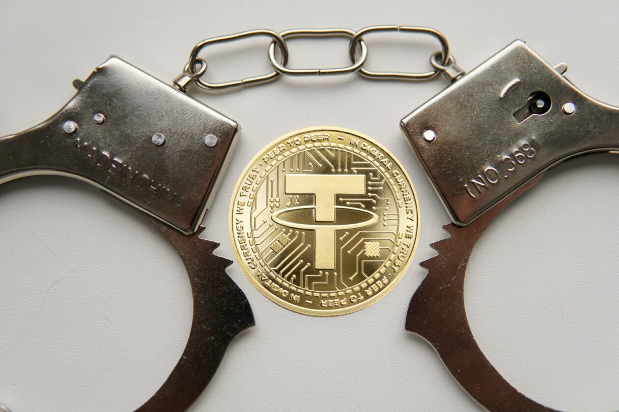 USDT coin and handcuffs | Chinese police uncover $54 million USDT money laundering scheme | China, USDT - Tether, Crime