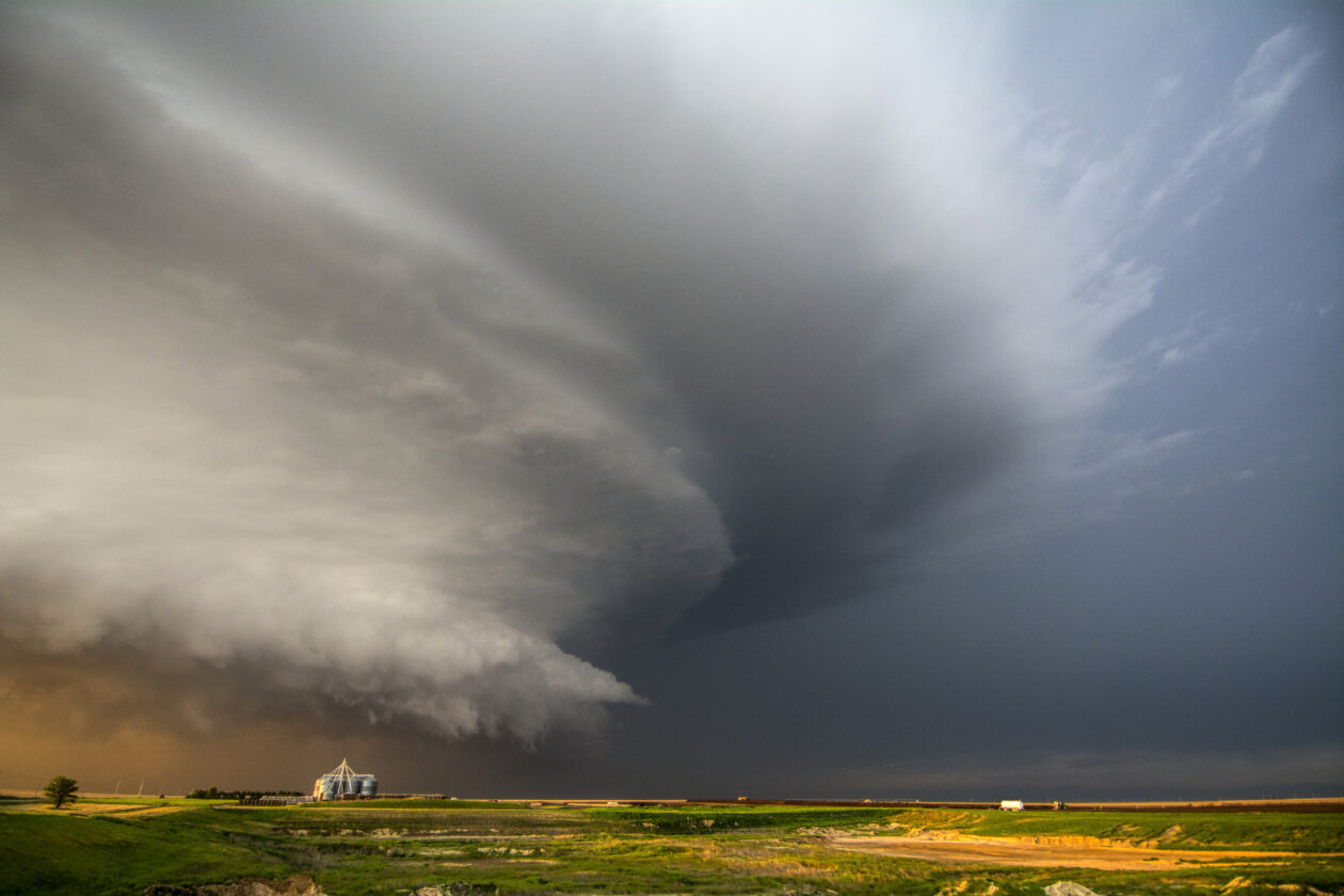 A tornado-producing supercell thunderstorm spinning over ranch land at sunset near Leoti, Kansas | US federal court upholds sanctions against Tornado Cash