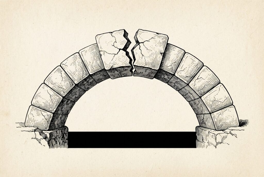An engraved masonry keystone at the apex of an arch, split by a single visible crack, the adjoining stones unbroken: a compromised load-bearing foundation.